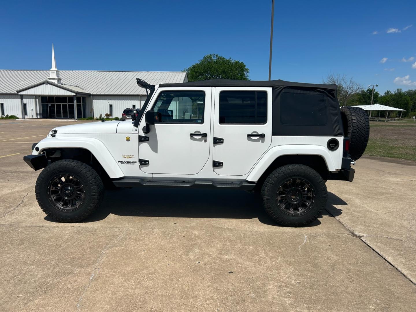 2013 White /BLACK Jeep Wrangler SAHARA (1C4BJWEG5DL) with an 3.6L V6 engine, AUTOMATIC transmission, located at 17760 Hwy 62, Morris, OK, 74445, (918) 733-4887, 35.609104, -95.877060 - Photo#7